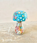 3.25” Mushroom Holding Baby (Blue)